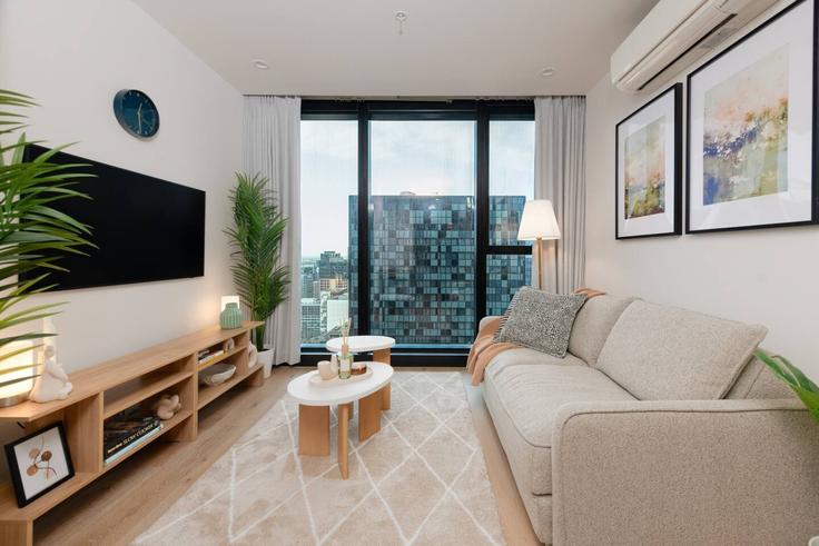 Building Timothy Lane - live-luxe - 1646032 adresindeki bir dairede modern mobilyalarla zarif bir şekilde tasarlanmış oturma odası Melbourne, Melbourne