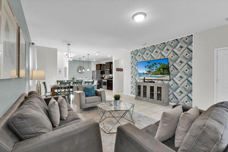 Davenport DavenportのBuilding Misty Oak Circle - livly-housing - 1248717 - MCOのアパートメントにある、モダンな家具を備えたエレガントなデザインのリビングルーム