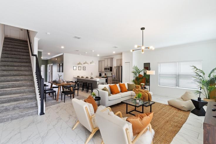 Elegante sala de estar con mobiliario moderno en un apartamento en Building Paragraph Drive - livly-housing - 1248869 - MCO en Kissimmee, Kissimmee