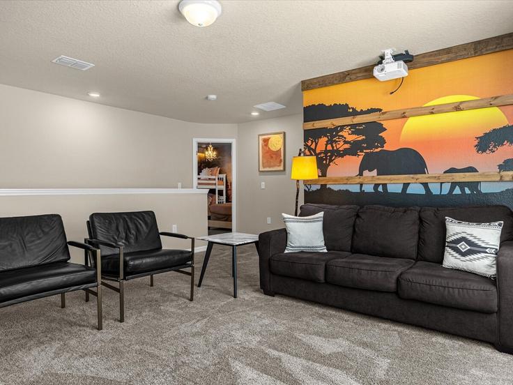 Salle de séjour élégante avec mobilier moderne dans un appartement à Building Summer Dr - livly-housing - 1248855 - MCO à Four Corners, Four Corners