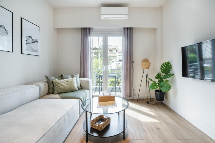 Elegantly designed living room with modern furnishings in an apartment at Building Chamosternas - localhost - 1220941 in Central Athens, Athens Elegantly designed living room with modern furnishings in an apartment at Building Chamosternas - localhost - 1220941 in Central Athens, Athens