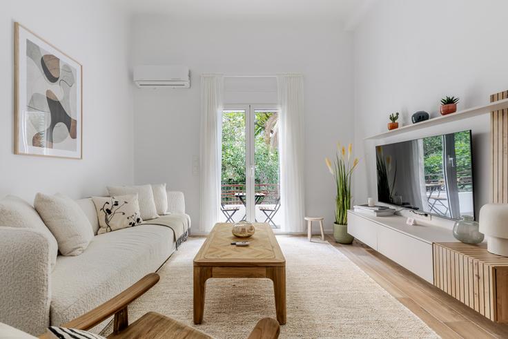 Athens Central AthensのBuilding Kaleschrou - localhost - 1221013のアパートメントにある、モダンな家具を備えたエレガントなデザインのリビングルーム