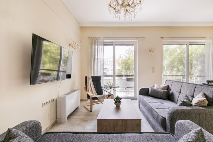 Salle de séjour élégante avec mobilier moderne dans un appartement à Building Mnisikleous - localhost - 1293845 à South Athens, Athens