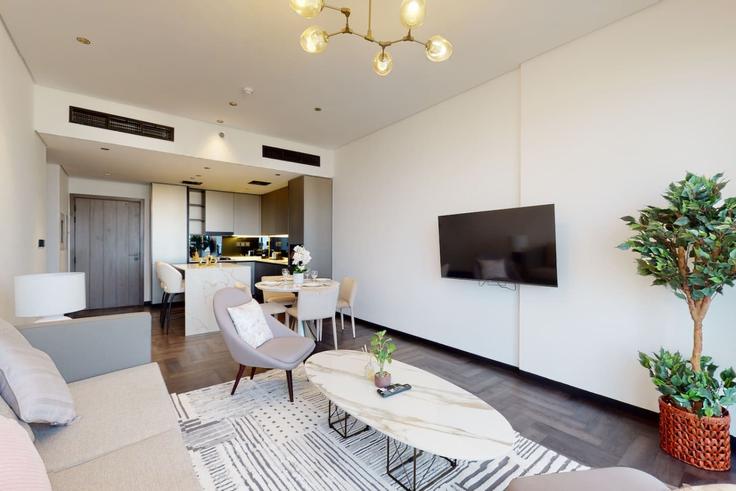 Al Jaddaf, Dubai에 위치한 Building Oud Metha Road - locationshostaway - 1050460 - DXB 유닛의 세련된 인테리어가 돋보이는 거실 Al Jaddaf, Dubai에 위치한 Building Oud Metha Road - locationshostaway - 1050460 - DXB 유닛의 세련된 인테리어가 돋보이는 거실