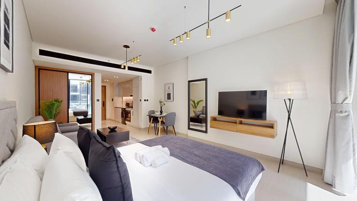 Dubai Jumeirah VillageのBuilding Tariaq Bedon Esm - locationshostaway - 1050912 - DXBのアパートメントにある、モダンな家具を備えたエレガントなデザインのリビングルーム Dubai Jumeirah VillageのBuilding Tariaq Bedon Esm - locationshostaway - 1050912 - DXBのアパートメントにある、モダンな家具を備えたエレガントなデザインのリビングルーム