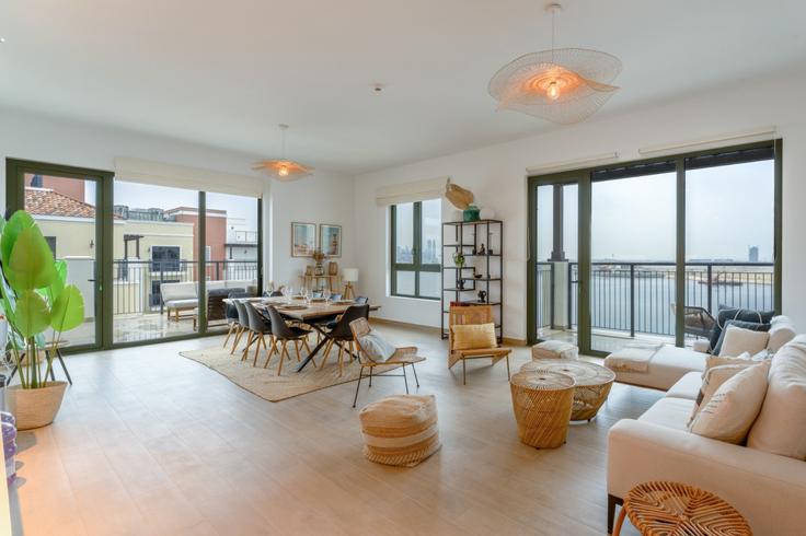 Elegantly designed living room with modern furnishings in an apartment at Building Tariaq Bedon Esm - locationshostaway - 1510881 in Jumeirah, Dubai