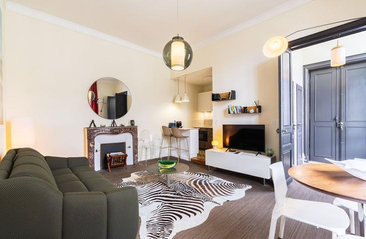 Elegantly designed living room with modern furnishings in an apartment at Building 14 Rue Bazoges, 17000 La Rochelle, France - lockey-conciergerie - 1698689 in La Rochelle, La Rochelle