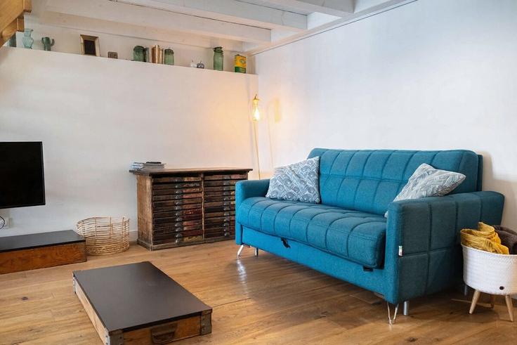 Elegantly designed living room with modern furnishings in an apartment at Building 41 Rue du Palais, 17000 La Rochelle, France - lockey-conciergerie - 1698687 in La Rochelle, La Rochelle