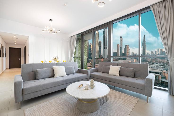 Elegante sala de estar con mobiliario moderno en un apartamento en Building Financial Center street - luxelivingcollection - 1287075 - DXB en Za'abeel, Dubai