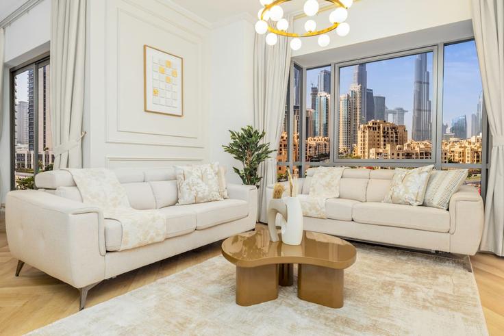 Elegante sala de estar con mobiliario moderno en un apartamento en Building Tariaq Bedon Esm - luxelivingcollection - 1466508 en Burj Khalifa, Dubai