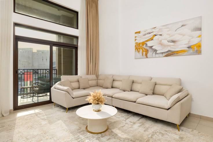 Elegantly designed living room with modern furnishings in an apartment at Building Jumeira Street - luxelivingcollection - 1631649 in Umm Suqeim, Dubai