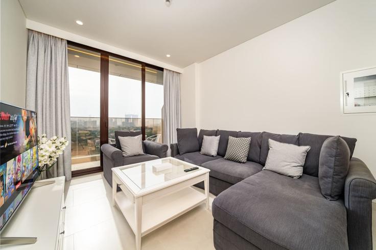 Salle de séjour élégante avec mobilier moderne dans un appartement à Building Estella 2 St - luxfolio-retreats-1 - 1604767 à Al Hebiah Fourth, Dubai Salle de séjour élégante avec mobilier moderne dans un appartement à Building Estella 2 St - luxfolio-retreats-1 - 1604767 à Al Hebiah Fourth, Dubai