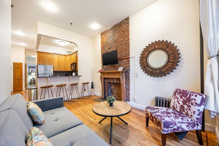New York ManhattanのBuilding West 134th Street - luxury-living-suites - 1424335のアパートメントにある、モダンな家具を備えたエレガントなデザインのリビングルーム
