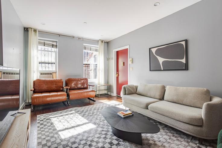 New York ManhattanのBuilding West 122nd Street - luxury-living-suites - 1424339のアパートメントにある、モダンな家具を備えたエレガントなデザインのリビングルーム