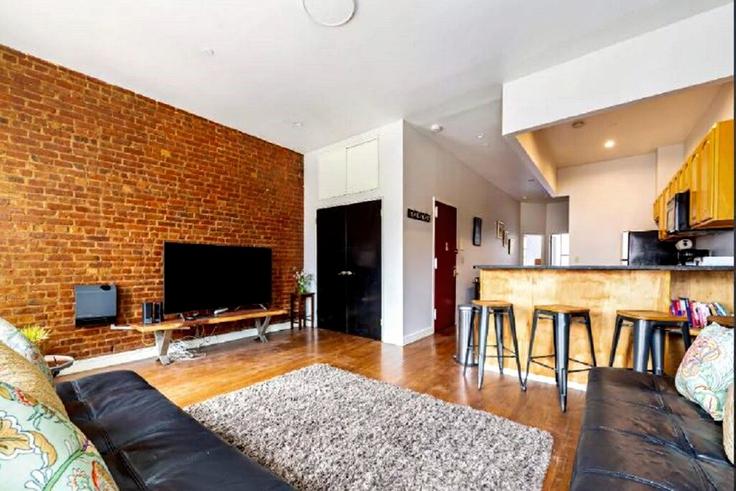 New York ManhattanのBuilding Malcolm X Boulevard - luxury-living-suites - 1424338のアパートメントにある、モダンな家具を備えたエレガントなデザインのリビングルーム