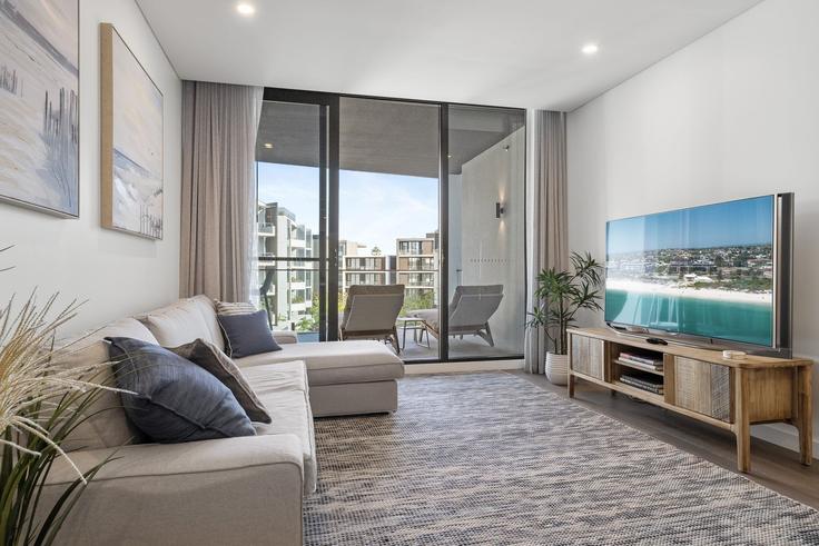 Salle de séjour élégante avec mobilier moderne dans un appartement à Building Leighton Beach Boulevard - madecomfy - 1560670 à North Fremantle, Perth Salle de séjour élégante avec mobilier moderne dans un appartement à Building Leighton Beach Boulevard - madecomfy - 1560670 à North Fremantle, Perth