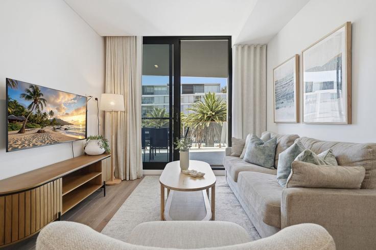 Salle de séjour élégante avec mobilier moderne dans un appartement à Building Leighton Beach Boulevard - madecomfy - 1560432 à North Fremantle, Perth Salle de séjour élégante avec mobilier moderne dans un appartement à Building Leighton Beach Boulevard - madecomfy - 1560432 à North Fremantle, Perth