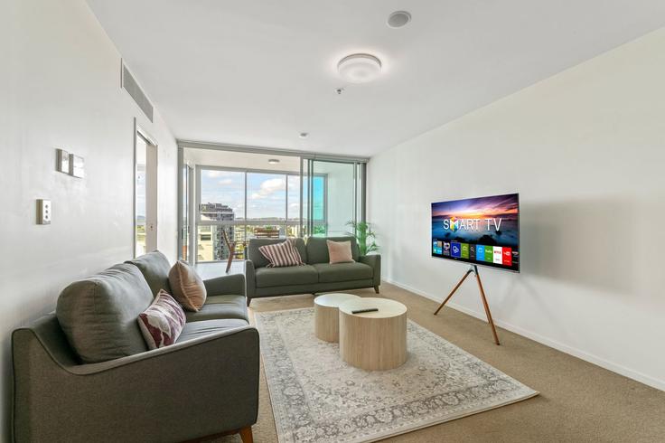 Salle de séjour élégante avec mobilier moderne dans un appartement à Building Thorn Street - madecomfy - 1560221 à Kangaroo Point, Brisbane Salle de séjour élégante avec mobilier moderne dans un appartement à Building Thorn Street - madecomfy - 1560221 à Kangaroo Point, Brisbane