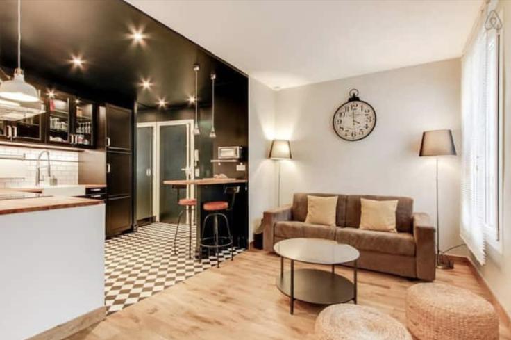 Salle de séjour élégante avec mobilier moderne dans un appartement à Building Rue de la Roquette - madeforyouhostaway - 1049630 - PAR à 11th arrondissement, Paris Salle de séjour élégante avec mobilier moderne dans un appartement à Building Rue de la Roquette - madeforyouhostaway - 1049630 - PAR à 11th arrondissement, Paris