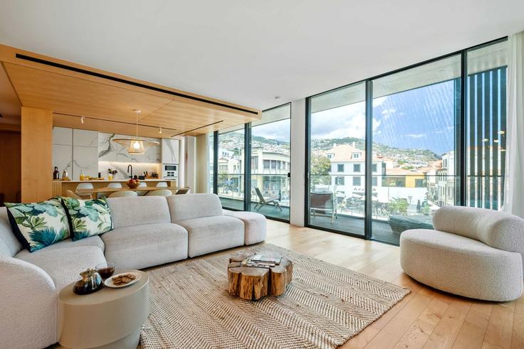 Elegantly designed living room with modern furnishings in an apartment at Building Largo do Pelourinho - madeira-nests - 1647379 in Funchal (Sé), Funchal Elegantly designed living room with modern furnishings in an apartment at Building Largo do Pelourinho - madeira-nests - 1647379 in Funchal (Sé), Funchal