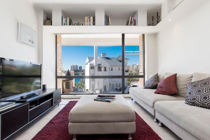 Elegante sala de estar con mobiliario moderno en un apartamento en Building Onslow Avenue - maisonnets - 1519924 en Elizabeth Bay, Sydney Elegante sala de estar con mobiliario moderno en un apartamento en Building Onslow Avenue - maisonnets - 1519924 en Elizabeth Bay, Sydney