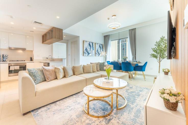 Elegantly designed living room with modern furnishings in an apartment at Building Tariaq Bedon Esm - manzil-life - 1382440 in Zaa'beel Second, Dubai
