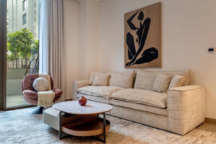 Elegantly designed living room with modern furnishings in an apartment at Building Tariaq Bedon Esm - manzil-life - 1382430 in Al Kheeran First, Dubai
