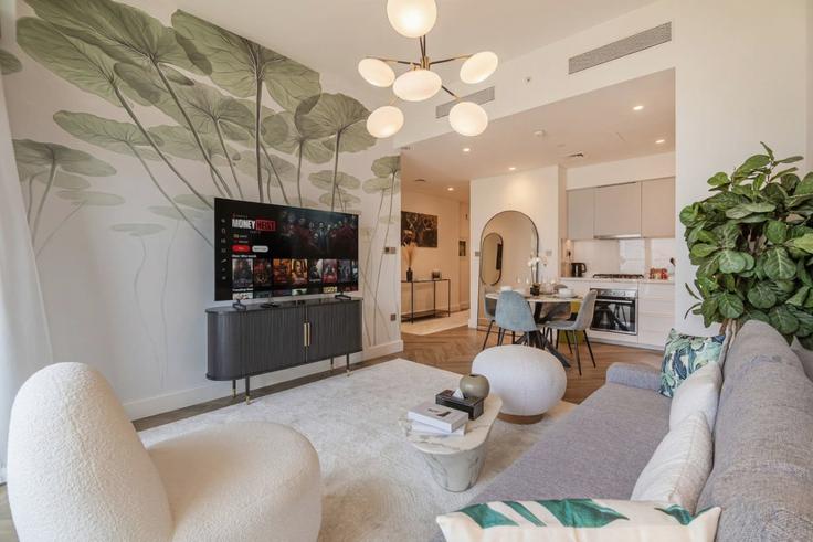 Elegantly designed living room with modern furnishings in an apartment at Building Burj Khalifa Boulevard - manzil-life - 1382425 in Burj Khalifa, Dubai Elegantly designed living room with modern furnishings in an apartment at Building Burj Khalifa Boulevard - manzil-life - 1382425 in Burj Khalifa, Dubai