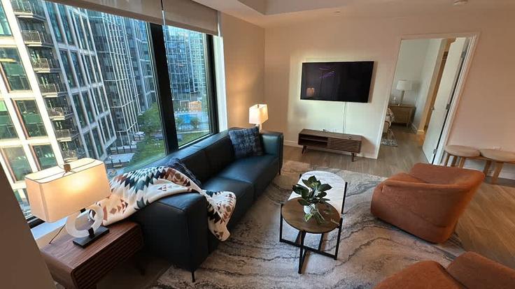 Building Foley Street - massliving - 1533539 adresindeki bir dairede modern mobilyalarla zarif bir şekilde tasarlanmış oturma odası Somerville, Somerville Building Foley Street - massliving - 1533539 adresindeki bir dairede modern mobilyalarla zarif bir şekilde tasarlanmış oturma odası Somerville, Somerville