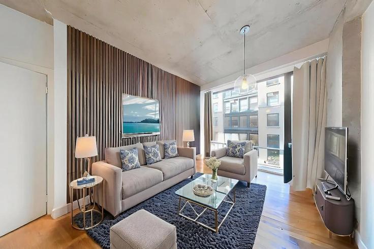 Salle de séjour élégante avec mobilier moderne dans un appartement à Building West 26th Street - max-lux-rentals - 1541849 à Manhattan, New York Salle de séjour élégante avec mobilier moderne dans un appartement à Building West 26th Street - max-lux-rentals - 1541849 à Manhattan, New York