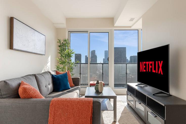 Elegant gestaltetes Wohnzimmer mit moderner Einrichtung in einer Wohnung im Building Jarvis Street - maxima-properties - 1403802 in Old Toronto, Toronto Elegant gestaltetes Wohnzimmer mit moderner Einrichtung in einer Wohnung im Building Jarvis Street - maxima-properties - 1403802 in Old Toronto, Toronto