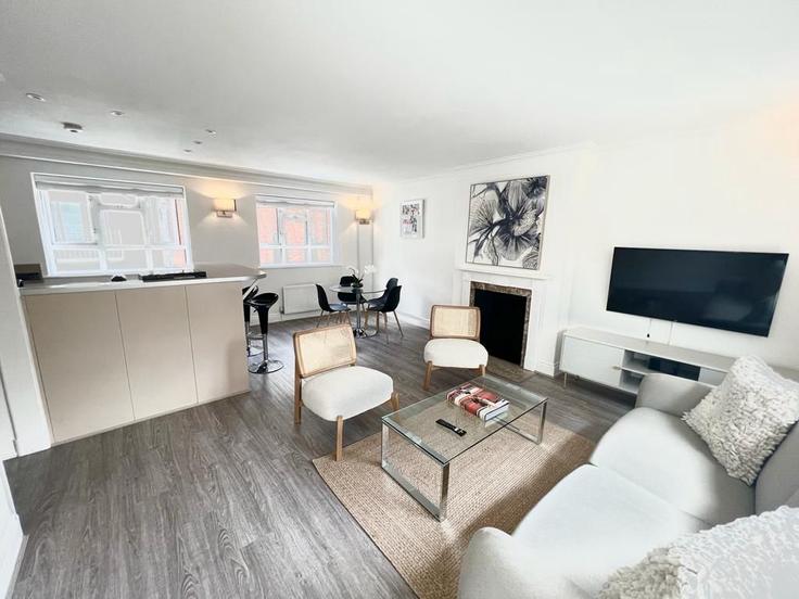 Elegantly designed living room with modern furnishings in an apartment at Building Curzon Street - mayfair-stays - 1468476 in City of Westminster, London Elegantly designed living room with modern furnishings in an apartment at Building Curzon Street - mayfair-stays - 1468476 in City of Westminster, London