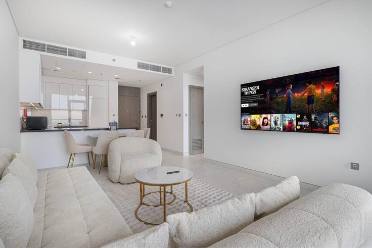 Elegantly designed living room with modern furnishings in an apartment at Building Tariaq Bedon Esm - medini-homes - 1333553 in Al Merkadh, Dubai