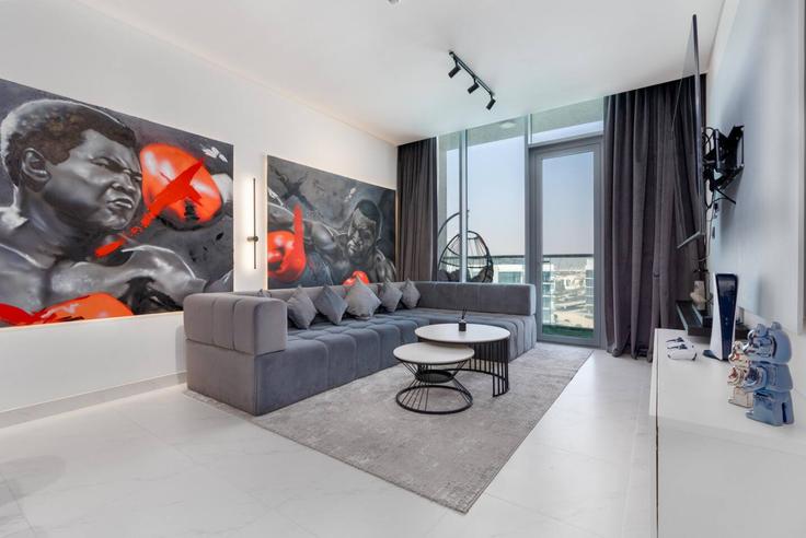 Elegantly designed living room with modern furnishings in an apartment at Building Tariaq Bedon Esm - medini-homes - 1333563 in Al Merkadh, Dubai