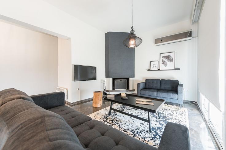 Salle de séjour élégante avec mobilier moderne dans un appartement à Building Kallirrois - meno-property-management - 1257479 - ATH à Central Athens, Athens Salle de séjour élégante avec mobilier moderne dans un appartement à Building Kallirrois - meno-property-management - 1257479 - ATH à Central Athens, Athens