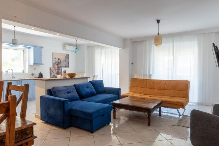 Elegantly designed living room with modern furnishings in an apartment at Building Athanasiou Diakou - meno-property-management - 1257458 - ATH in South Athens, Athens