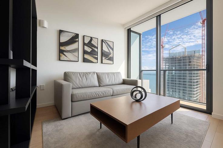 Elegante sala de estar con mobiliario moderno en un apartamento en Building Northeast 5th Street - miami-vacation-rentals - 1321335 en Miami, Miami