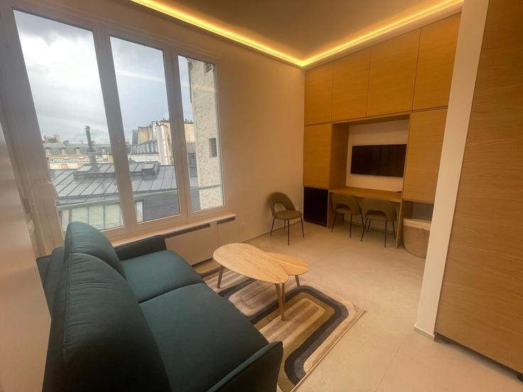 Salle de séjour élégante avec mobilier moderne dans un appartement à Building Boulevard Saint-Germain - milalelo - 1363842 à 6th arrondissement, Paris Salle de séjour élégante avec mobilier moderne dans un appartement à Building Boulevard Saint-Germain - milalelo - 1363842 à 6th arrondissement, Paris