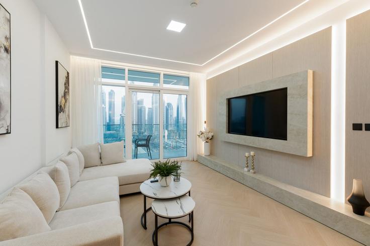 Elegantly designed living room with modern furnishings in an apartment at Building Tariaq Bedon Esm - mint-stay-homes-rental-llc - 1296386 - DXB in The Palm Jumeirah, Dubai Elegantly designed living room with modern furnishings in an apartment at Building Tariaq Bedon Esm - mint-stay-homes-rental-llc - 1296386 - DXB in The Palm Jumeirah, Dubai