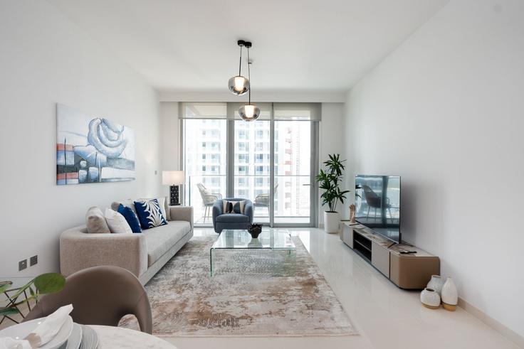 Elegantly designed living room with modern furnishings in an apartment at Building Tariaq Bedon Esm - mint-stay-homes-rental-llc - 1296443 - DXB in The Palm Jumeirah, Dubai Elegantly designed living room with modern furnishings in an apartment at Building Tariaq Bedon Esm - mint-stay-homes-rental-llc - 1296443 - DXB in The Palm Jumeirah, Dubai