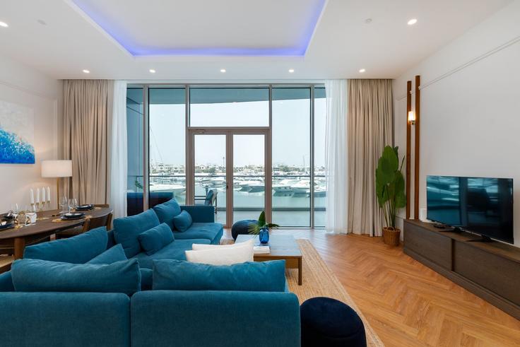 Elegantly designed living room with modern furnishings in an apartment at Building Tariaq Bedon Esm - mint-stay-homes-rental-llc - 1296493 - DXB in The Palm Jumeirah, Dubai Elegantly designed living room with modern furnishings in an apartment at Building Tariaq Bedon Esm - mint-stay-homes-rental-llc - 1296493 - DXB in The Palm Jumeirah, Dubai
