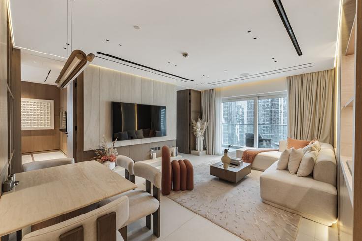Dubai Al Thanyah FifthのBuilding Tariaq Bedon Esm - mint-stay-homes-rental-llc - 1506210のアパートメントにある、モダンな家具を備えたエレガントなデザインのリビングルーム