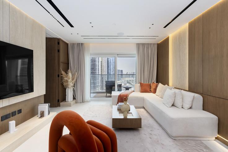 Sala de estar elegantemente projetada com móveis modernos em um apartamento no Building Tariaq Bedon Esm - mint-stay-homes-rental-llc - 1506210 em Al Thanyah Fifth, Dubai Sala de estar elegantemente projetada com móveis modernos em um apartamento no Building Tariaq Bedon Esm - mint-stay-homes-rental-llc - 1506210 em Al Thanyah Fifth, Dubai