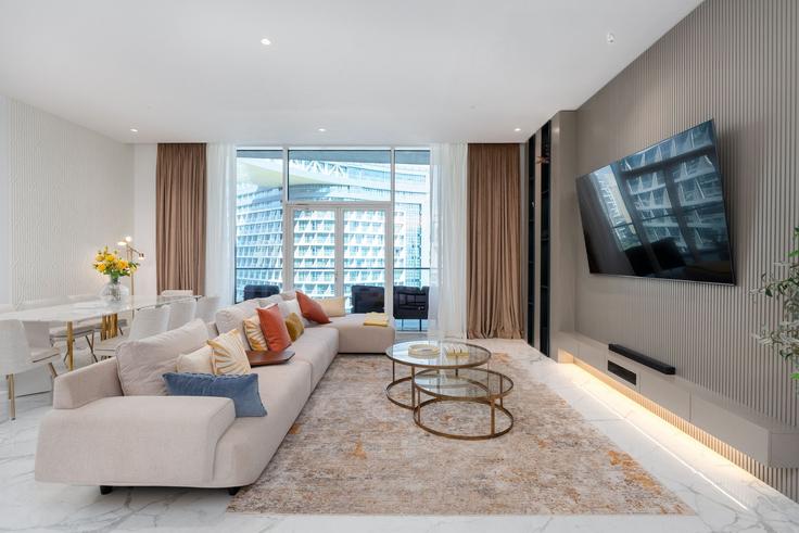 Elegantly designed living room with modern furnishings in an apartment at Building Tariaq Bedon Esm - mint-stay-homes-rental-llc - 1296389 - DXB in The Palm Jumeirah, Dubai Elegantly designed living room with modern furnishings in an apartment at Building Tariaq Bedon Esm - mint-stay-homes-rental-llc - 1296389 - DXB in The Palm Jumeirah, Dubai