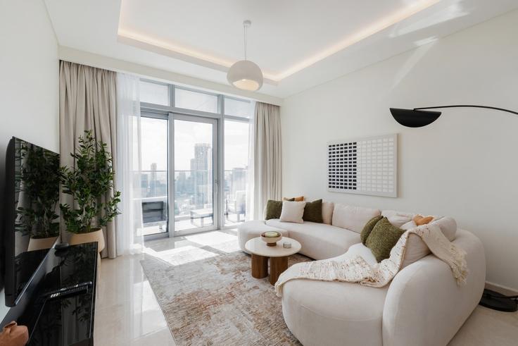 Dubai Burj KhalifaのBuilding Burj Khalifa Boulevard - mint-stay-homes-rental-llc - 1395319のアパートメントにある、モダンな家具を備えたエレガントなデザインのリビングルーム