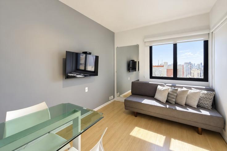 Salle de séjour élégante avec mobilier moderne dans un appartement à Building Alameda Lorena - mon-apart-homes-llc - 1627143 à Jardim Paulista, São Paulo Salle de séjour élégante avec mobilier moderne dans un appartement à Building Alameda Lorena - mon-apart-homes-llc - 1627143 à Jardim Paulista, São Paulo