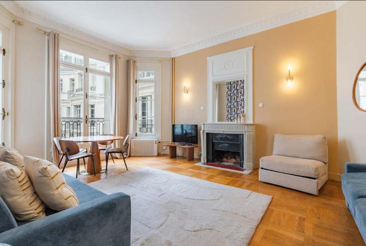 Elegantly designed living room with modern furnishings in an apartment at Building Rue de la Pompe - montaigne - 1379472 in 16th arrondissement, Paris