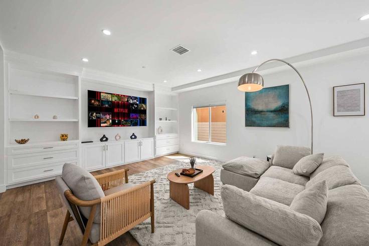 Elegantly designed living room with modern furnishings in an apartment at Building West Upland Avenue - month2month - 1581909 in Los Angeles, Los Angeles Elegantly designed living room with modern furnishings in an apartment at Building West Upland Avenue - month2month - 1581909 in Los Angeles, Los Angeles