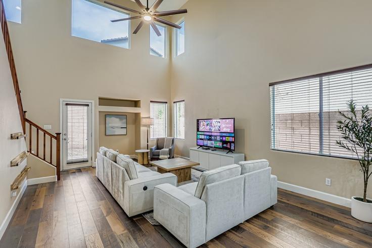 Elegantly designed living room with modern furnishings in an apartment at Building Big Window Street - month2month - 1581870 in Enterprise, Enterprise