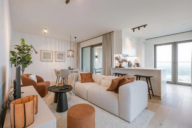Sala de estar elegantemente projetada com móveis modernos em um apartamento no Building Troonstraat - moroww - 1390018 em Ostend, Ostend Sala de estar elegantemente projetada com móveis modernos em um apartamento no Building Troonstraat - moroww - 1390018 em Ostend, Ostend